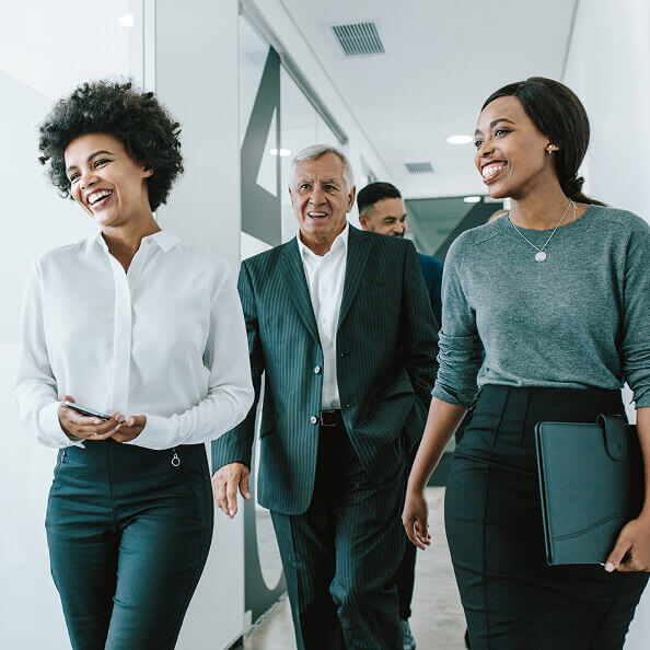 Executives walking down a hallway